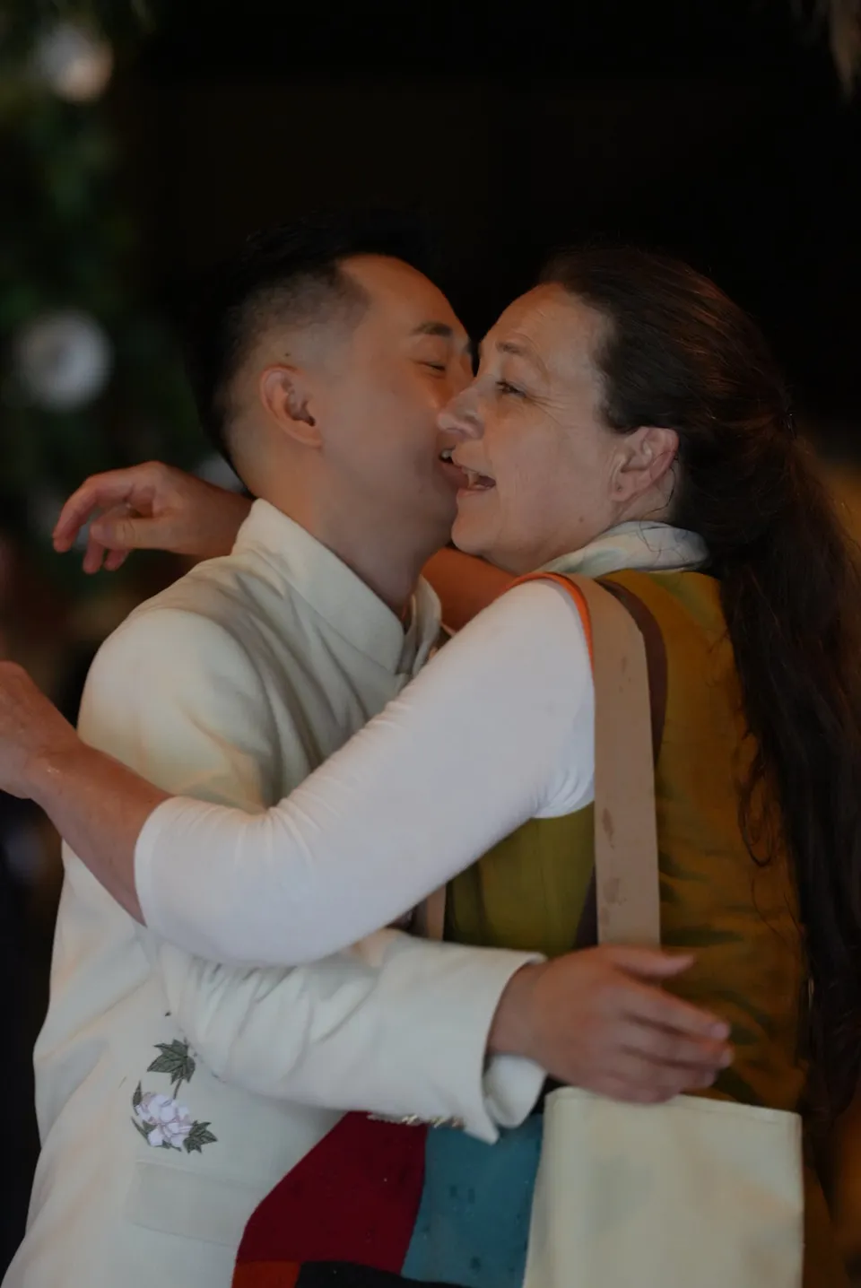 Ricky embracing a guest at the reception.