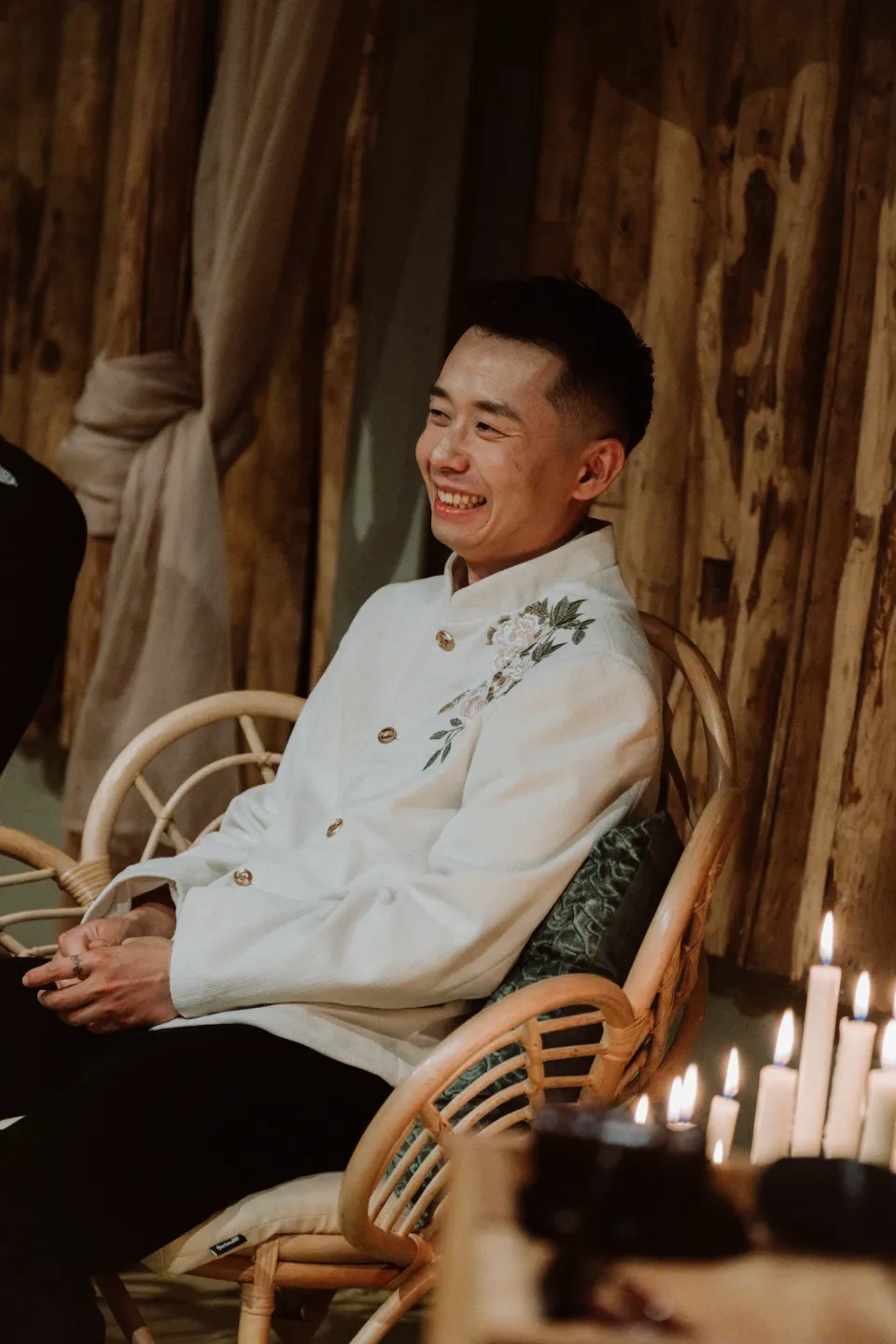 Ricky smiling in the ceremony room.