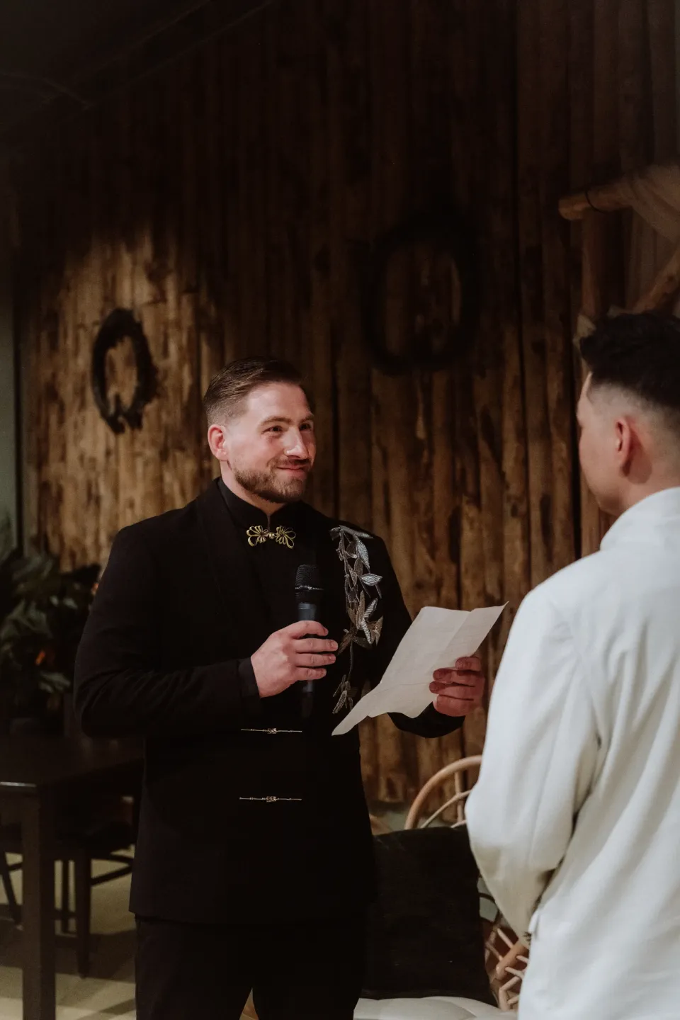 Kees reading his vows to Ricky.