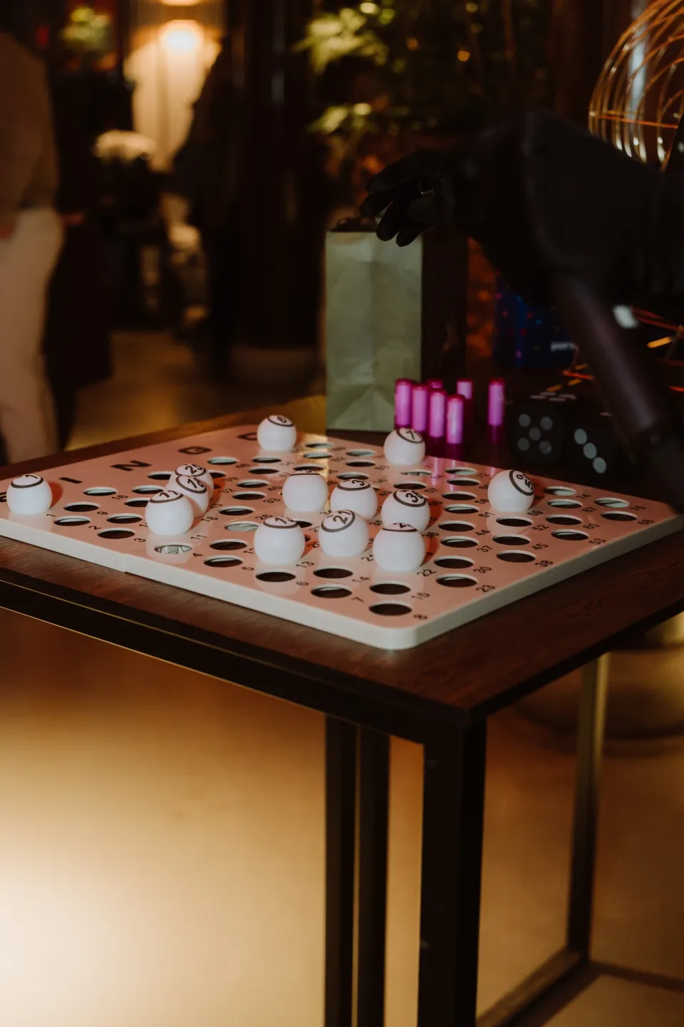 A Drag Queen Bingo prop ready on the table.